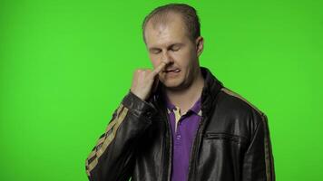 Funny stupid man picking nose. Silly brainless humorous expression, removing boogers, bad manners video