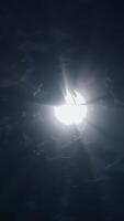 An imaginative and futuristic light source illuminating a dark and immersive environment video