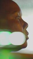 A Reflective Profile of a Child Captured in Gentle Soft Light, Evoking Deep Emotions and Desire video