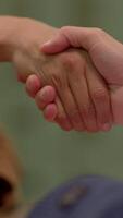 The image of Intertwined Hands Represents the Deep Connection and Support Shared Between Individuals video