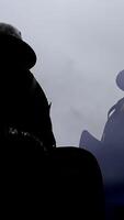A silhouette of a mysterious figure stands out in a foggy landscape, creating intrigue video
