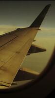 This is an Aerial View from an Airplane Window showcasing the beauty of the world below video