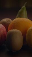 A Colorful and Appealing Assortment of Fresh and Juicy Fruits Displayed on a Dark Surface video