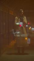 A Mysterious Figure Stands Alone in an Urban Setting Under the Night Skys Enchantment video