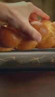 An Elegant Black and Gold Decorative Object Positioned Gracefully on a Wooden Surface video