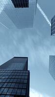 A Skyward View Capturing Modern Skyscrapers Set Against a Beautiful Blue Sky Above video