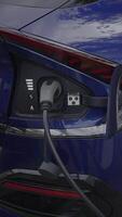 A CloseUp View of an Electric Vehicle Charging Port, Showcasing Its Design and Efficiency video