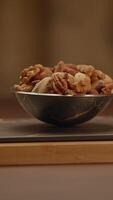 A Bowl of Irresistibly Delicious Mixed Nuts, Perfect for Snacking, and Enjoyed by Everyone video