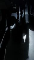 Silhouetted Shadows in Motion Across a Gleaming Surface Creating Unforgettable Visuals video