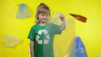 Girl activist with cellophane and paper packages. Reduce plastic pollution. Save ecology environment video