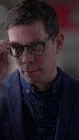 A Focused Man Engaged in Thoughtful Discussion About Strategy in a Professional Setting video