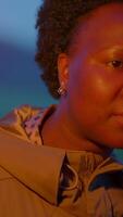 Illuminated Perspective A Thoughtful Gaze Behind the Flickering Flame in the Darkness video