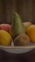 An Assorted Selection of Fresh Fruits Beautifully Presented in a Decorative Bowl for Enjoyment video