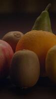 A Colorful Assortment of Fresh Fruits Artfully Arranged on a Beautiful Wooden Table video