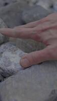 A Gentle Touch on Smooth Rocks Found in a Beautiful Natural Setting Surrounded by Nature video