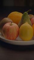 A Platter Filled with a Colorful and Assorted Selection of Fresh Seasonal Fruits for Enjoyment video