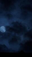 The Night Sky features dark clouds lit by soft moonlight, creating a captivating view video