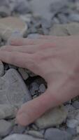 A Gentle Touch on Rocky Terrain, exploring the artistry of interaction with natures elements video
