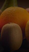 A stunning visual of colorful, fresh fruits beautifully arranged with soft lighting video