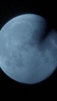 A stunning closeup view of the Moon beautifully illuminated in the vast night sky above video