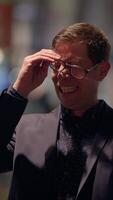 A Smiling Professional in a Modern Setting, Radiating Positivity and Charm in Business Atmosphere video