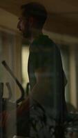 A Man Exercising Indoors, Displaying Focus and Determination in His Workout Routine video