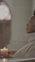 In a tranquil space, reflecting in the warm glow of candlelight, filled with calm and comfort video