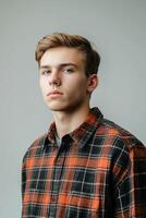 man in checkered red shirt portrait photo
