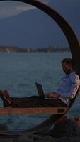 Working Remotely by the Tranquil Water An Inviting and Serene Escape to Natures Beauty video
