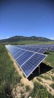 Solar panel array generating clean energy in open field photo