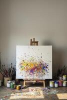 Abstract painting in progress on easel in art studio photo