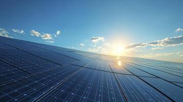 Solar panels capturing sunlight under a cloudy sky at sunset photo