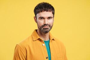 Portrait of smiling bearded man wearing stylish casual clothes, looking at camera, fashion model photo