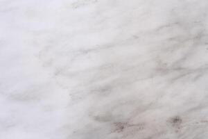White marble texture showing a subtle pattern of grey veins photo