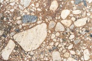 Texture of stone wall showing different sized rocks photo