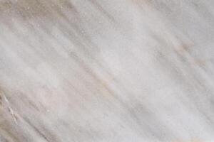 Polished marble stone background with diagonal veins photo