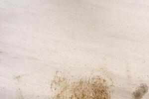 Polished marble stone background showing dirt and grime photo