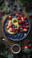 Healthy breakfast featuring avocado toast and fresh berries photo