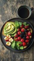 Delicious healthy breakfast featuring toast with avocado and berries accompanied by coffee photo