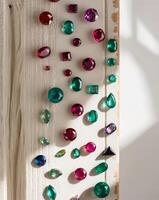 A wall with many colorful gems on it photo