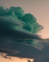 A large green cloud is seen in the sky photo