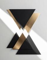 A black and gold triangle wall art piece photo