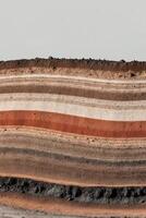 A large pile of dirt with different colors photo