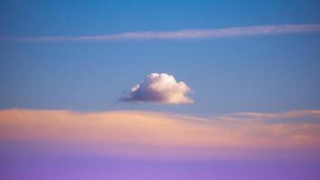 A plane flying in the sky with a cloud in the background photo