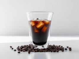 A glass of iced coffee with coffee beans photo