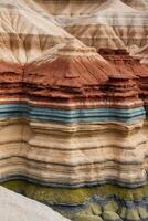 A colorful rock formation in the desert photo