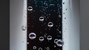 A close up of bubbles in a window photo