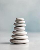 A stack of white stones on a table photo