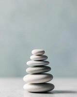 A stack of white stones on a table photo