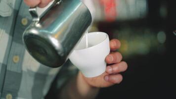 Art of making cappuccino in a cup. Latte with a pattern video